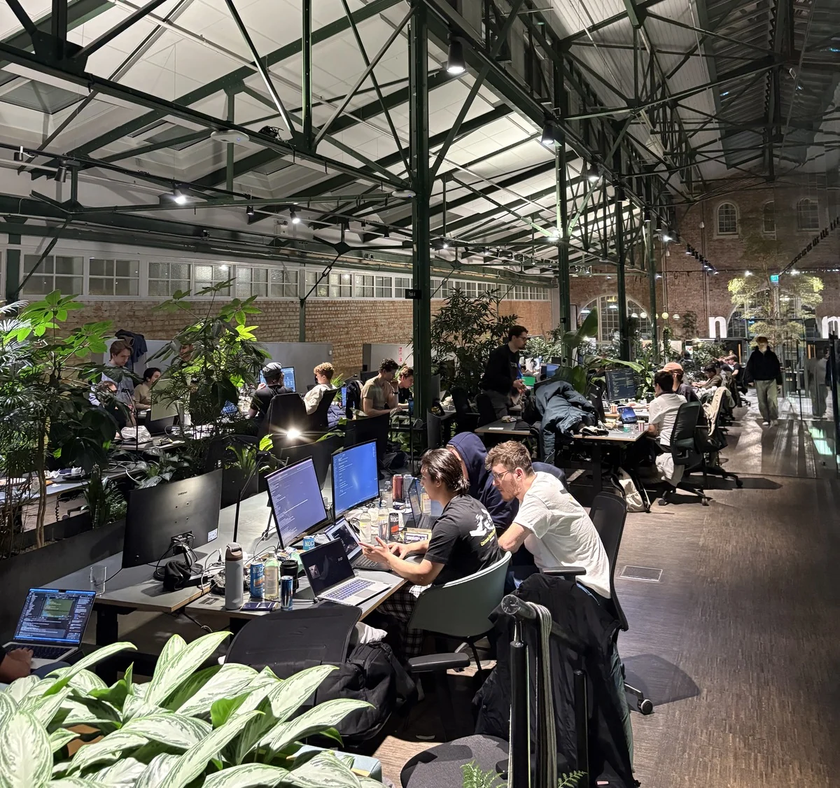 Teams at work at their tables during the hackathon in Stockholm